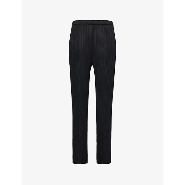 Pleats Please Issey Miyake Pleated slim-fit knitted jersey trousers