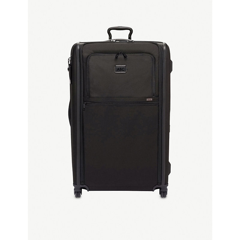 Tumi Worldwide Trip expandable 4-wheeled suitcase