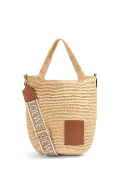 Slit bag in raffia and calfskin