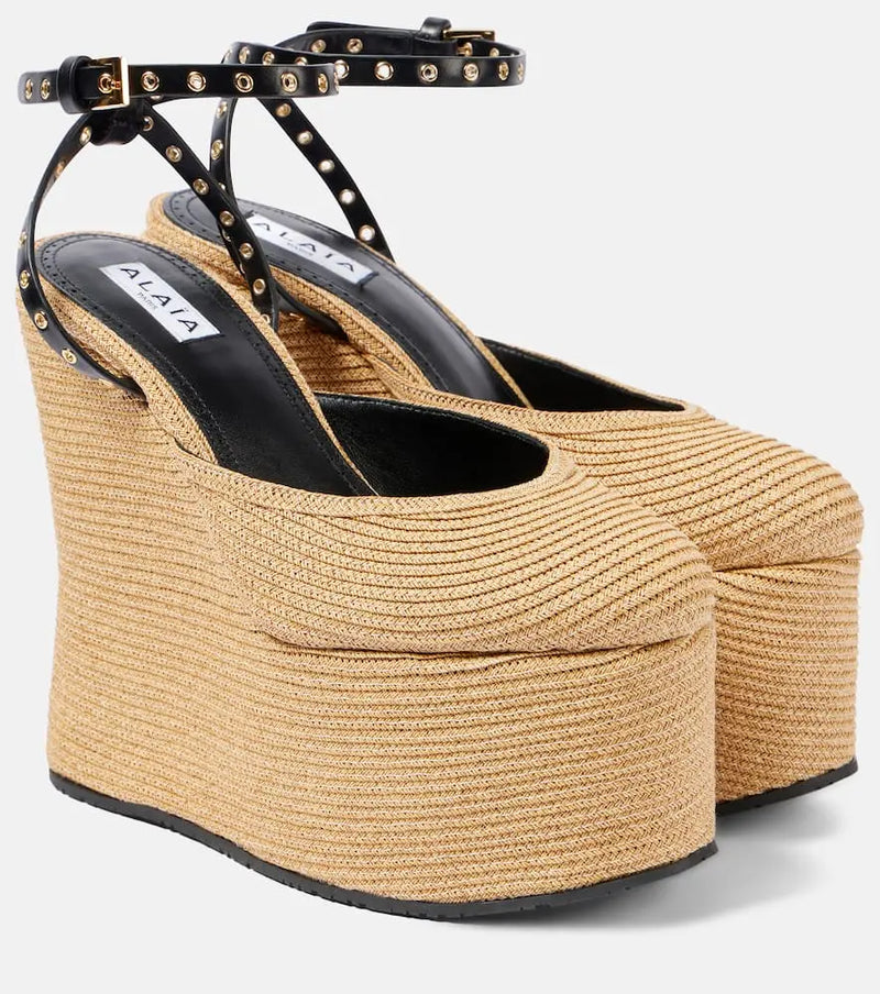 Alaïa LA leather-trimmed paper straw wedges