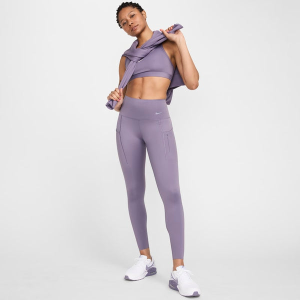 Leggings de tiro alto de 7/8 de sujeción firme con bolsillos para mujer Nike Go - Morado