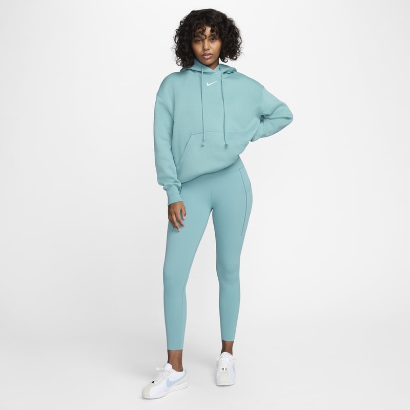 Leggings de 7/8 de tiro alto y sujeción media con bolsillos para mujer Nike Universa - Azul