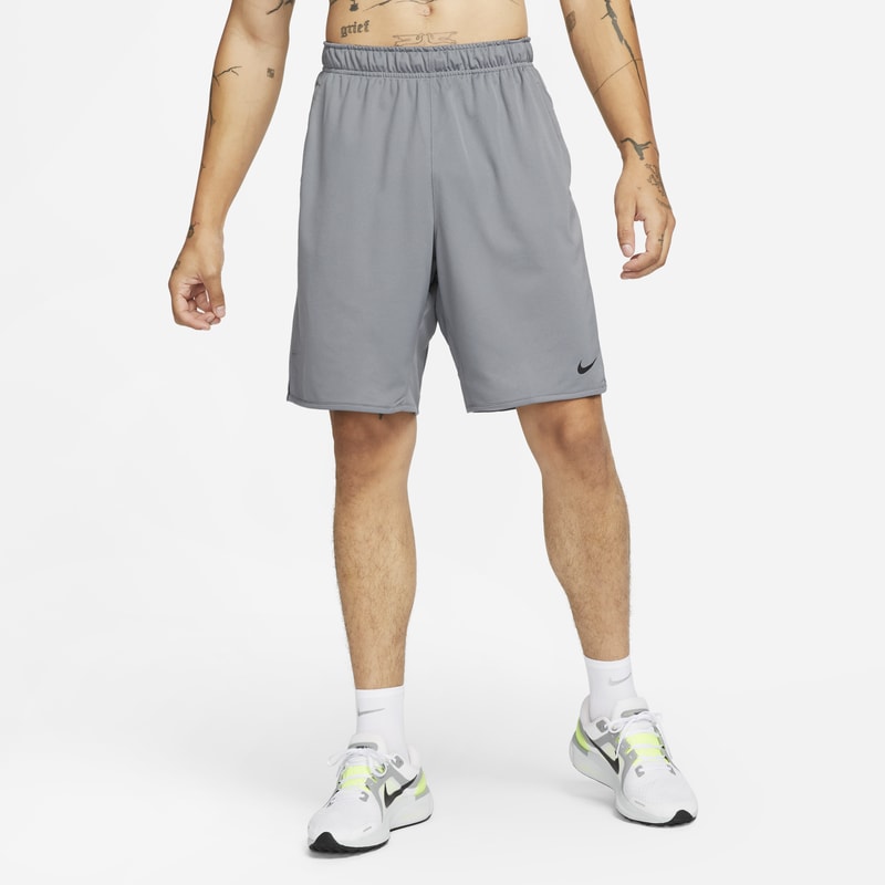 Shorts versátiles sin forro Dri-FIT de 23 cm para hombre Nike Totality - Gris