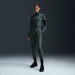 Pants de correr de tiro medio de 7/8 para mujer Nike Dri-FIT Fast - Verde