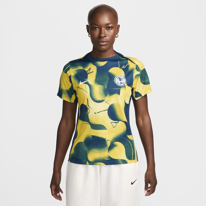 Playera de fútbol de manga corta Nike Dri-FIT para antes del partido para mujer Club América Academy Pro - Amarillo