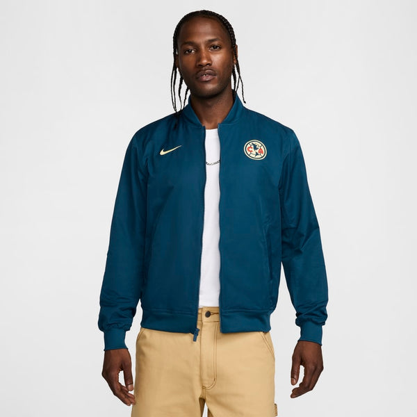 Chamarra bomber de fútbol Nike de tejido Woven y sin forro para hombre Club América Sport Essentials - Azul