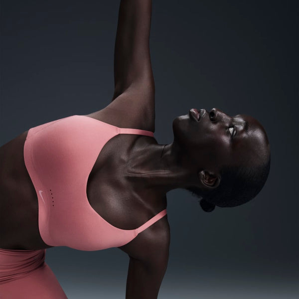 Bra deportivo convertible con almohadillas de baja sujeción para mujer Nike Alate Minimalist - Rosa