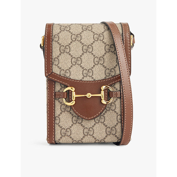 Gucci Monogram-print horsebit-embellished coated-canvas cross-body bag