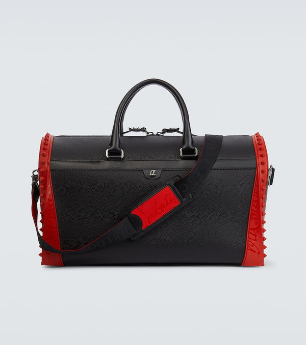 Christian Louboutin Sneakender spiked leather duffel bag