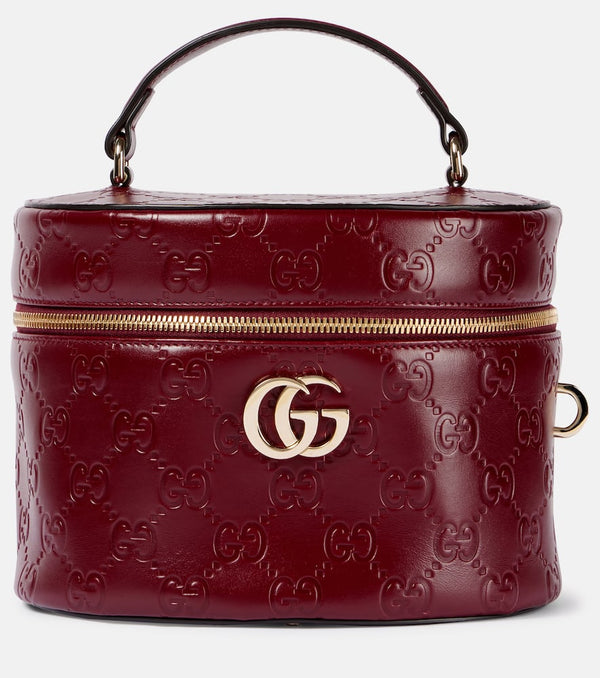 Gucci GG embossed leather vanity bag