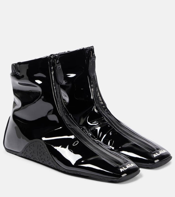 Alaïa Sneaker faux patent leather ankle boots