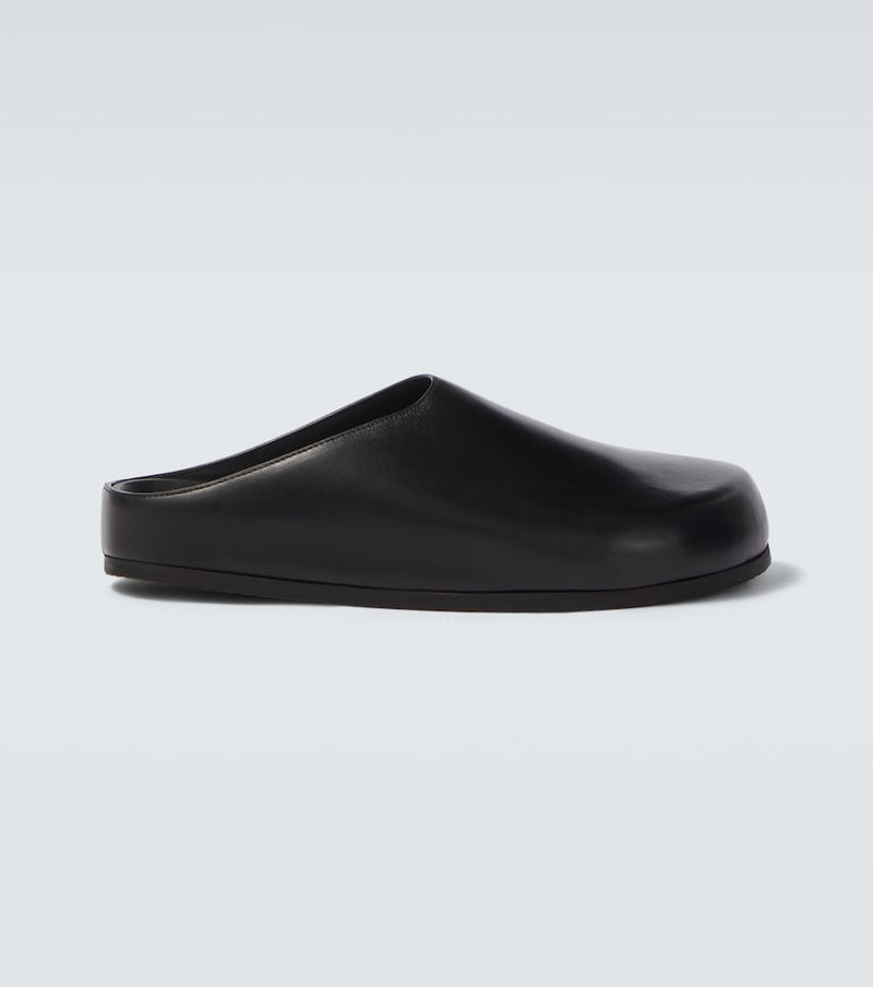 Studio Nicholson Wearing leather mules in Black