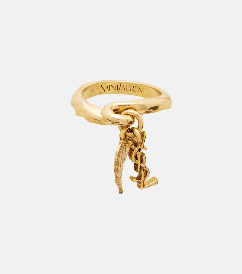 Saint Laurent Cassandre ring — gold band with engraved logo and dangling YSL charm detail