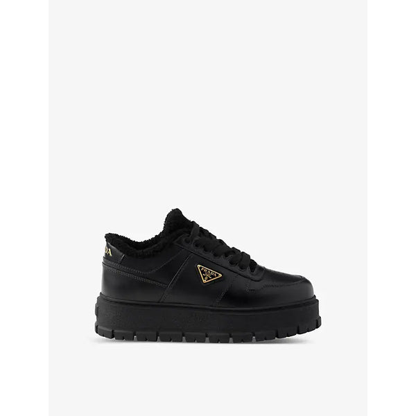 Prada Brand-plaque shearling-lined leather mid-top trainers