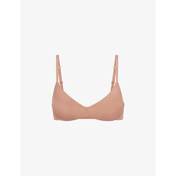 Skims Wireless Form logo-embossed plunge stretch-cotton bra