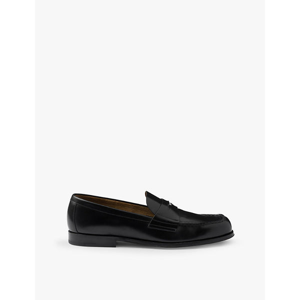 Prada Logo-badge slip-on leather loafers