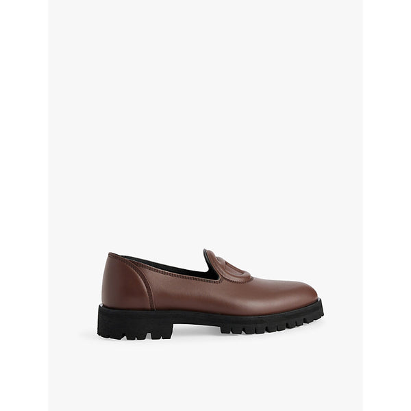 Telfar Embossed-logo almond-toe leather loafers