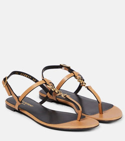 Saint Laurent Cassandra leather thong sandals | LYBSTORE