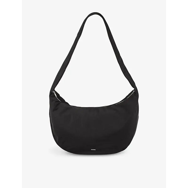 Sandro Curved logo-plaque woven shoulder bag | Sandro