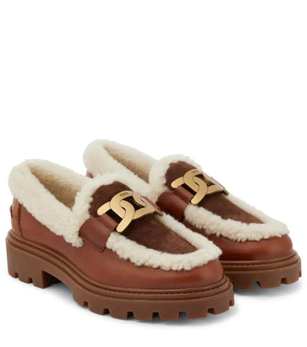 Tod's Kate leather and shearling loafers | LYBSTORE