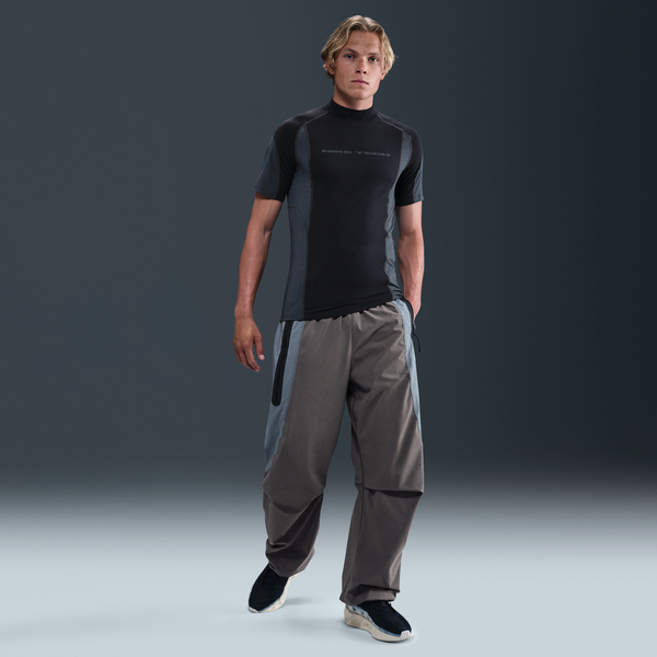 Pants De Tejido Woven Dri-Fit De Colores Contrastantes Oversized Para Hombre Nike Tech Gris
