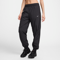 Joggers de tiro medio holgados con protección contra los rayos UV para mujer Nike Sportswear Classic Wovens Negro