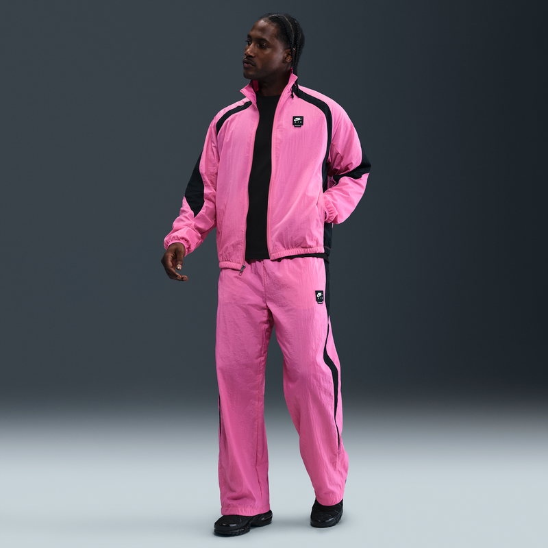 Pants deportivos de tejido Woven para hombre Nike Air Rosa