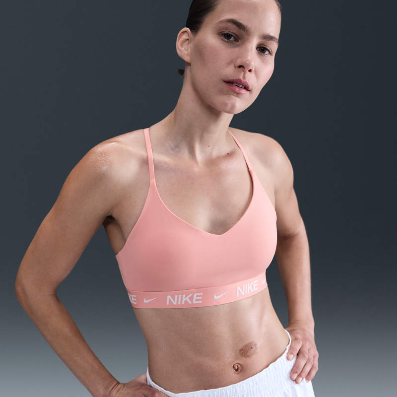 Bra deportivo ajustable con almohadillas para mujer Nike Indy Light Support Rosa