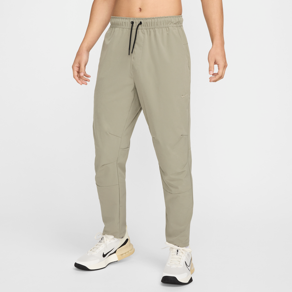 Pants Versátiles Dri-Fit De Pierna Entallada Para Hombre Nike Unlimited Verde