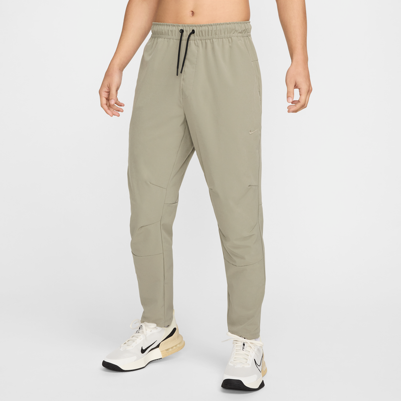 Pants Versátiles Dri-Fit De Pierna Entallada Para Hombre Nike Unlimited Verde